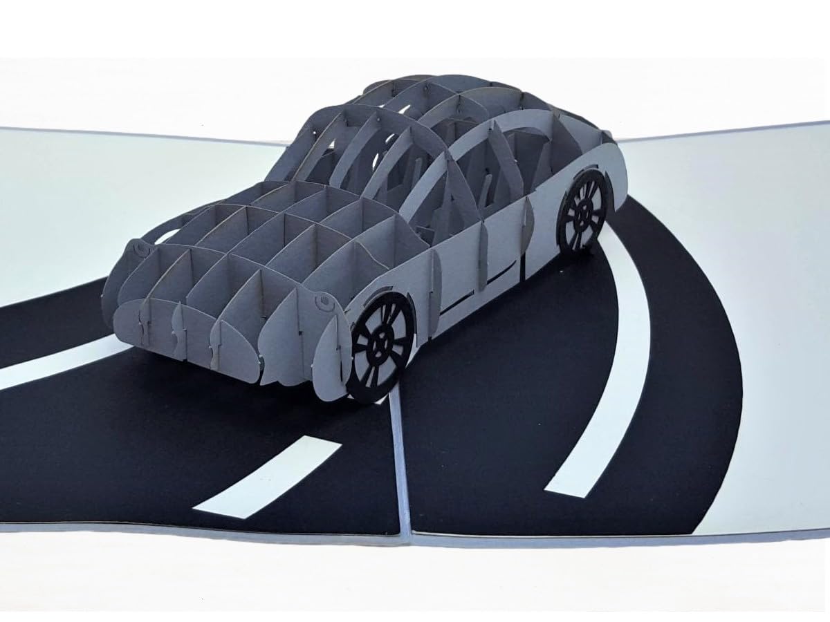 Gray sports car 3D pop-up card displayed on a black-and-white winding road