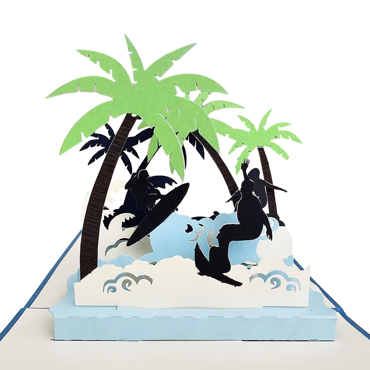 Close view of 3D surfing pop-up card with surfer silhouettes, waves and palm trees