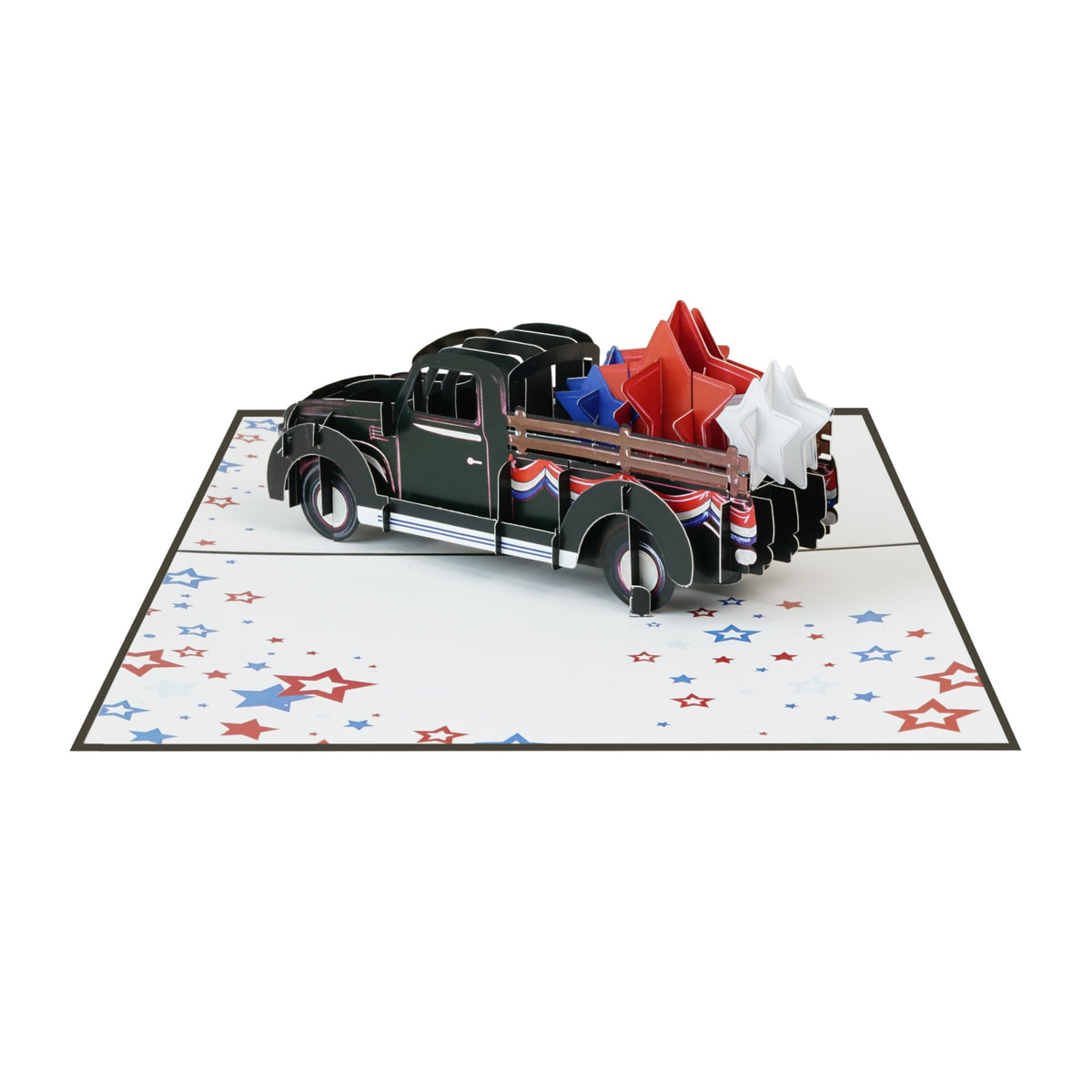 Patriotic truck pop-up greeting card with star-patterned interior and layered stars in the truck bed