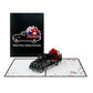 Black cover reading Classic Truck, Timeless Patriotism beside the open patriotic truck 3D card