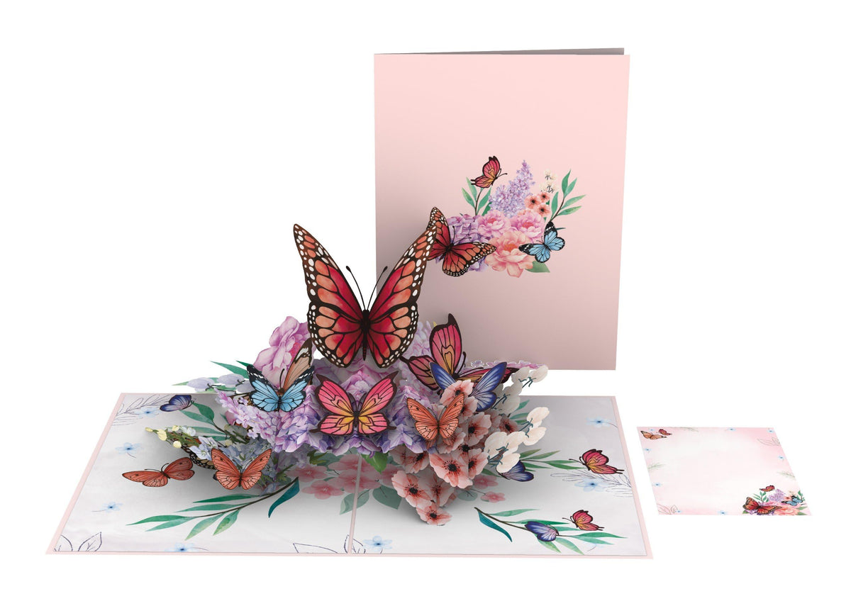 Butterfly pop-up greeting card displayed with pink floral cover and separate coordinating notecard